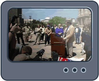 Television screen with changing images of media at political events.