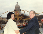 Briscoe and wife ride in inaugural parade